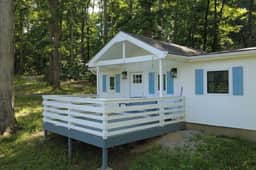 Secluded 51-Acre Retreat: 2 Cabins, Pond & Gardens - Image 3